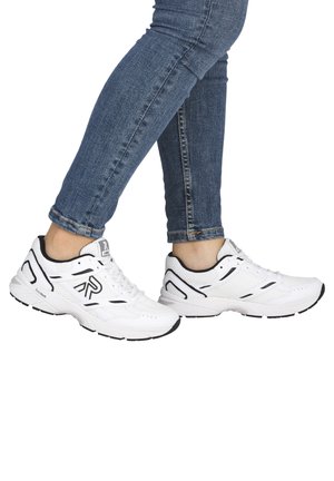 White athletic shoes with textured mesh upper, black accents, and flexible sole. Features branded logo and lacing system for secure fit.