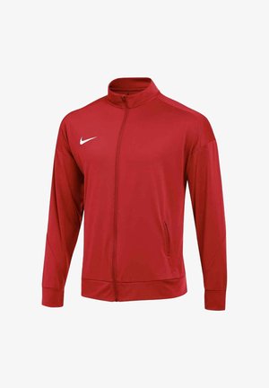 Giacca sportiva rossa con cerniera intera, maniche lunghe, colletto alto, tasche laterali e logo Nike swoosh bianco sul petto sinistro.
