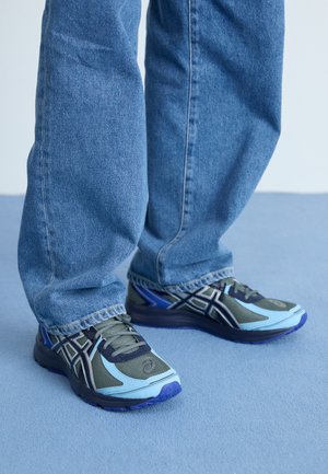 JOG 100 S UNISEX - Sneaker low - steel grey/midnight
