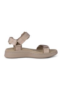 Beige sandal with broad, adjustable straps and a cushioned footbed. The wedge sole offers a slight height increase with a smooth texture.