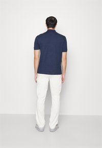 Lacoste Polokošeľa - bleu chine