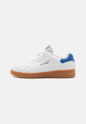 White athletic shoe with a smooth leather upper, blue accents on the heel and tongue, and a gum rubber sole, featuring a lace-up design.