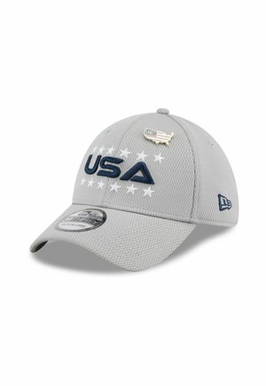 Gray mesh baseball cap with "USA" embroidered in navy, white stars around text, and a small USA flag pin shaped like a map on front panel.