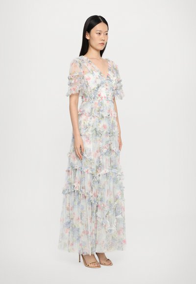 Maxi-jurk met bloemenprint en gelaagde ruches in pastelkleuren, voorzien van doorschijnende korte mouwen en een V-halslijn. Gemaakt van lichtgewicht stof.