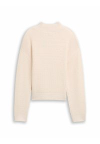 Crème geribbelde gebreide trui met een hoge kraag, verlaagde schouders en een cropped pasvorm. Heeft zijdetails met een textuurontwerp.