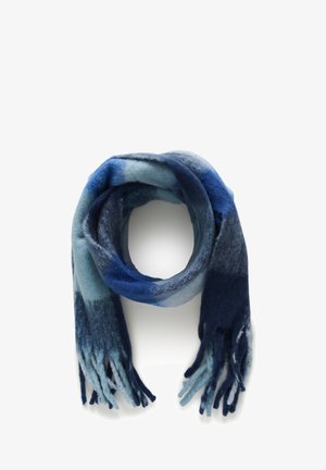 Woolen scarf featuring a gradient of blue shades, with soft texture, fringe ends, and a circular shape for draping.