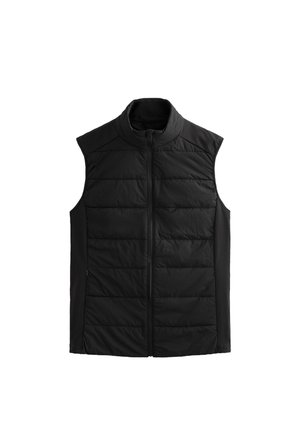 Čierna bezrukávová puff vestá má vysoký golier, prešívané predné panely, hladké strany a predný zips. Je ľahká a teplá.