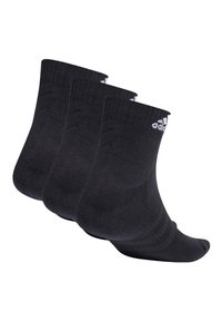 Schwarze Knöchelsocken aus einem weichen Material mit gerippter Textur. Enthält drei Paare mit weißem Branding nahe der Oberkante.