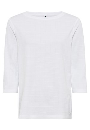 Witte, lange mouwen shirt gemaakt van gestructureerde stof met een ruitpatroon. Heeft een ronde halslijn en een comfortabele pasvorm.