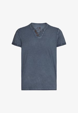 T-shirt à manches courtes, bleu profond, avec un col en V et trois boutons marron. Le tissu a une finition douce et légèrement texturée.