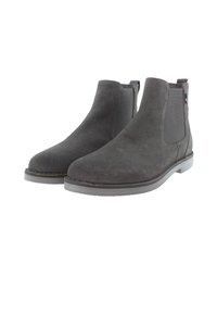 Botas Chelsea de ante gris con paneles laterales elásticos, punta redondeada y suelas de goma. Presentan costuras mínimas y un diseño plano y de perfil bajo.
