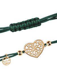 Zielona pleciona bransoletka z charmon złotym filigranowym sercem oraz dwoma złotymi akcentami. Regulowany design z dekoracyjnym węzłem.