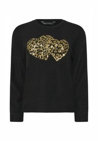 Svart sweatshirt med ett guld leopardtryck hjärtdesign gjort av paljetter. Långa ärmar och rund halsringning. Mjuk textur.