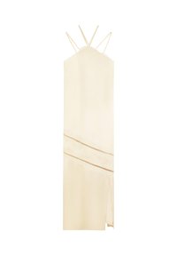 Robe couleur crème avec une silhouette droite, des finitions en dentelle délicate et des bretelles spaghetti ajustables, complétée par une fente latérale pour ajouter du détail.