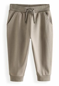 Hellbraune, cropped Jogginghosen mit Kordelzugbund, seitlichen Taschen und gerippten Bündchen auf weißem Hintergrund.