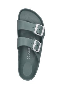 Green slide sandal with two adjustable straps and white buckles, made of smooth plastic material. Flat footbed and textured sole. Size 37.