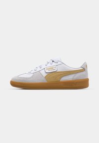 White and tan Puma Palermo sneaker with gum sole, suede details, and white laces shown from the side on a plain background.