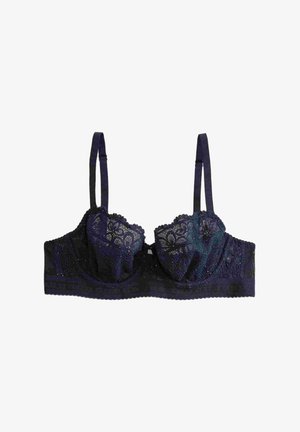 Lace bralette in dark navy featuring underwire cups, scalloped lace trim, adjustable straps, and a textured band.