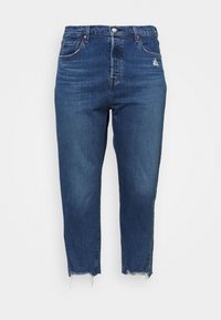 Tmavě modré džínové kalhoty s vysokým pasem a rovnými nohavicemi, s třepícími se lemy, diskrétními oprýskanými detaily a klasickým pětipocket designem.