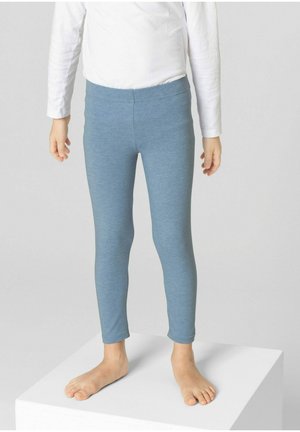 Blue cotton leggings with a smooth texture, tapered fit, and elastic waistband, worn by a child standing barefoot.