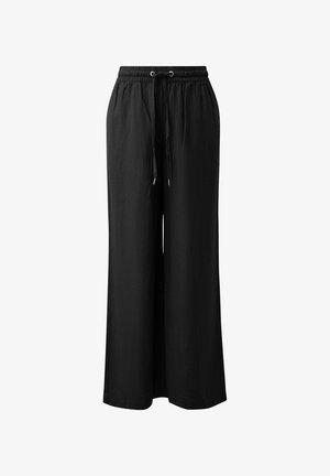 Zwarte wijde broek met elastische tailleband en verstelbaar trekkoord, gemaakt van lichtgewicht stof.