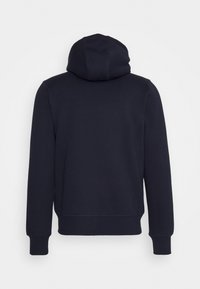 Sudadera marina con capucha, con un tejido texturizado, puños y dobladillo acanalados, y un diseño simple y sin adornos.