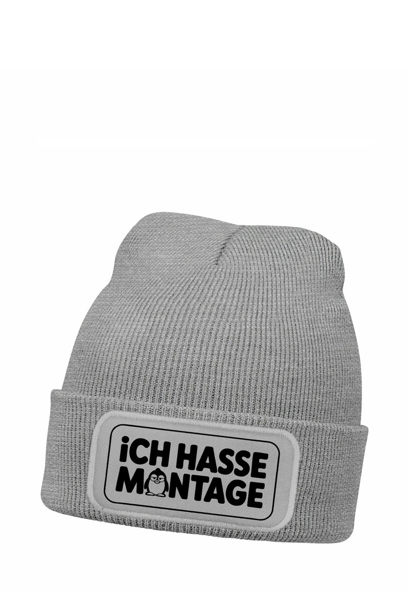 Light gray knitted beanie with folded cuff and black text "ICH HASSE MONTAGE" with a small penguin illustration on the front patch.