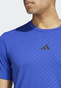 adidas Performance POWER WORKOUT - T-shirt till träning - semi lucid blue black
