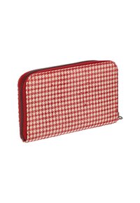 Rektangulær pung med et rødt og kremfarvet houndstooth mønster, lynlås lukning og rød stof omkring kanterne. Struktureret overflade.