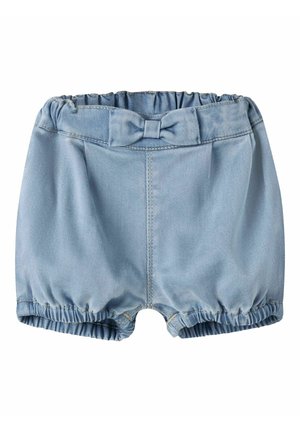 Vaaleansiniset vauvan shortsit, joissa joustava vyötärönauha ja lahkeensuut. Edessä vyötäröllä kangasrusetti.