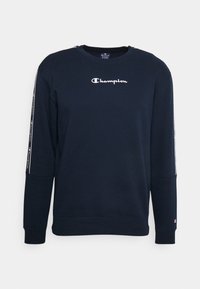 Marineblauwe sweatshirt van katoen, met een ronde hals, lange mouwen en een wit Champion-logo op de borst en mouwen.