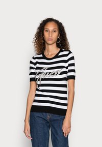Guess ODETTA - T-shirt estampada - black and white