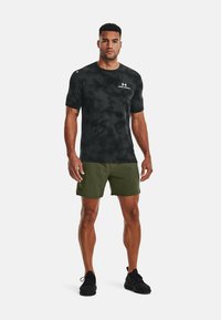 Under Armour VANISH WOVEN - Sports shorts - marine od green
