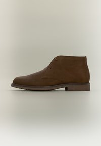 Επιλέχθηκε, dark brown