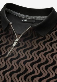 Next FLOCKED - Pikeepaita - black swirl