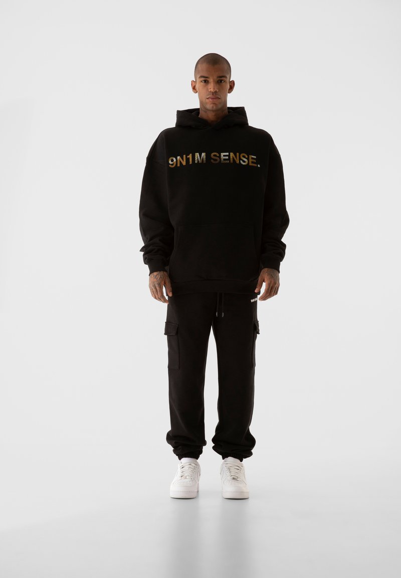 Modello di cucito pantaloni da bambino scampanati