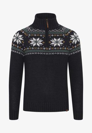 Tumši zils adīts džemperis ar rāvējslēdzēja kaklu. Ir rakstots yoke ar baltām sniegpārsliņām, zaļām, dzeltenām un baltām akcentiem. Ribotas aproces un apakšmalas.