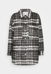 Geruite jas in zwart, wit en grijstinten, met knoopsluiting, kraag, twee voorzakken en een textuur met een zachte stofafwerking.