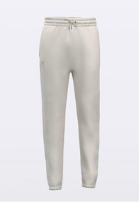 Svijetlosmeđe bež trenirke od flisa s elastičnim pojasom, vezicama za zatvaranje i detaljem logotipa na lijevoj nozi. Glatka tekstura, suženi zglobovi.