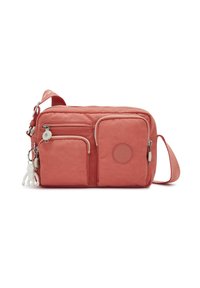 Coral nylon crossbody bag with multiple zippered pockets, a soft texture, and a fabric strap. Features a round logo and a white charm.