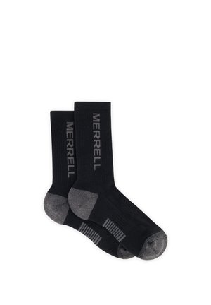 Paire de chaussettes noires montantes avec talons, orteils et bandes de soutien de la voûte plantaire grises, arborant le texte « MERRELL » sur les côtés.