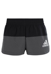 Svarta atletiska shorts med ett horisontellt randigt mönster i vitt. Har en elastisk midja och en broderad logotyp på nederkantens högra sida.