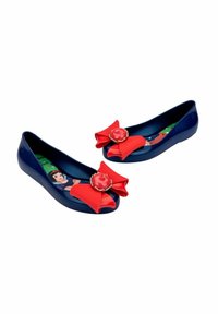 Navy slip-on ballet flats with oversized red bows and a decorative rose at the toe. Features a colorful illustrated insole.