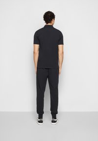 Ellesse NIAMA - Polokošeľa - black