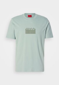 DELASTIO - T-shirt imprimé - light pastel green
