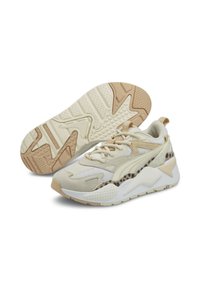 Beige sneakers featuring mesh and suede uppers, textured sole with rubber accents, and a distinctive leopard print panel.