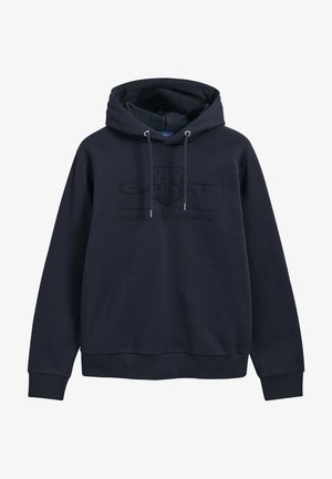Marineblaue Kapuzenjacke aus weichem Stoff, mit einem vorne eingravierten Logo in derselben Farbe, einer Kordelzugkapuze und gerippten Bündchen.