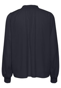 Blusa lunga a maniche con polsini arricciati e scollatura smock in un elegante blu navy scuro, vista da dietro.