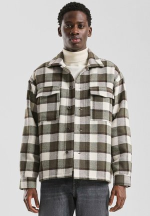 Lichte jas - wollweiß