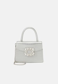 Silver, croc-embossed handbag with a rectangular shape, top handle, and detachable chain strap. Features a jeweled buckle on the front.